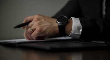 photo of person holding black pen